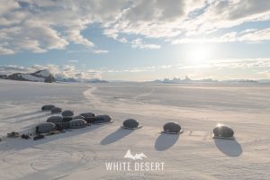 white desert village in antartica